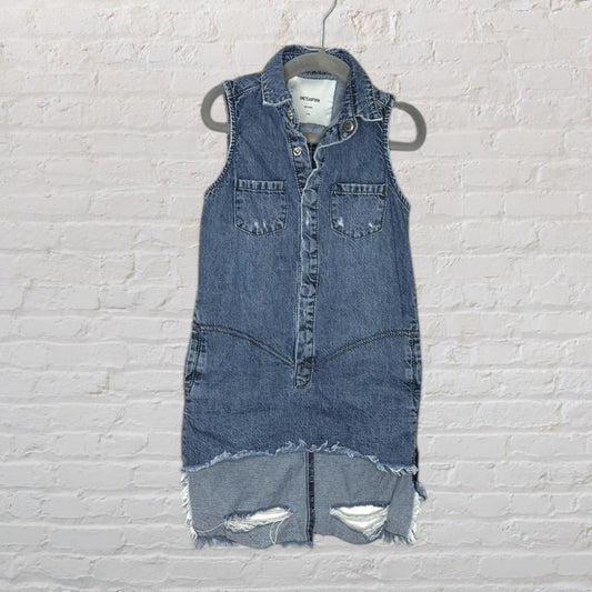 Sleeveless blue denim dress with distressed details and frayed hem, featuring chest pockets.