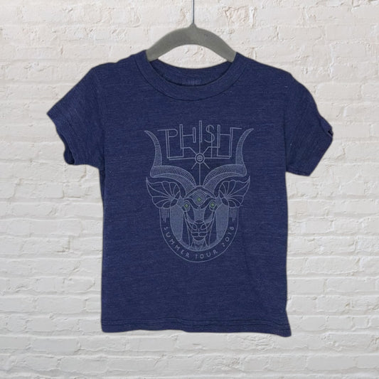 Navy blue T-shirt featuring Phish Summer Tour 2018 graphic design with a ram motif, displayed on a hanger.