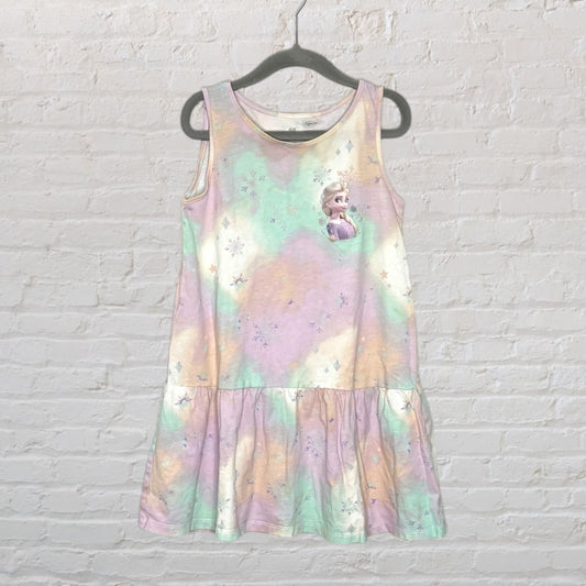 Pastel multicoloured sleeveless dress featuring a printed image of Elsa from Disney's Frozen, hanging on a black hanger.