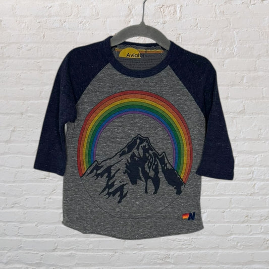 Gray raglan tee with navy sleeves, featuring a rainbow and mountain graphic, by Aviator Nation.