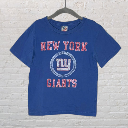 Blue New York Giants T-shirt with NFL East Division logo and text, displayed on a hanger.